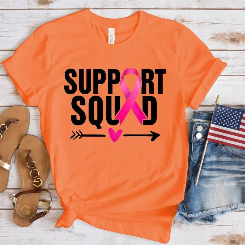 the SUPPORT SQUAD - Breast Cancer Awareness Support Squad Printed Short Sleeve Shirts for Women