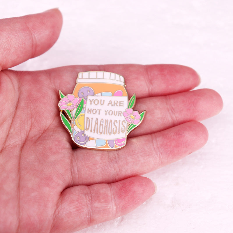 the DIAGNOSIS - You Are Not Your Diagnosis Enamel Pin, Prescription Pill Bottle Brooch, Mental Health Awareness Badge Jewelry
