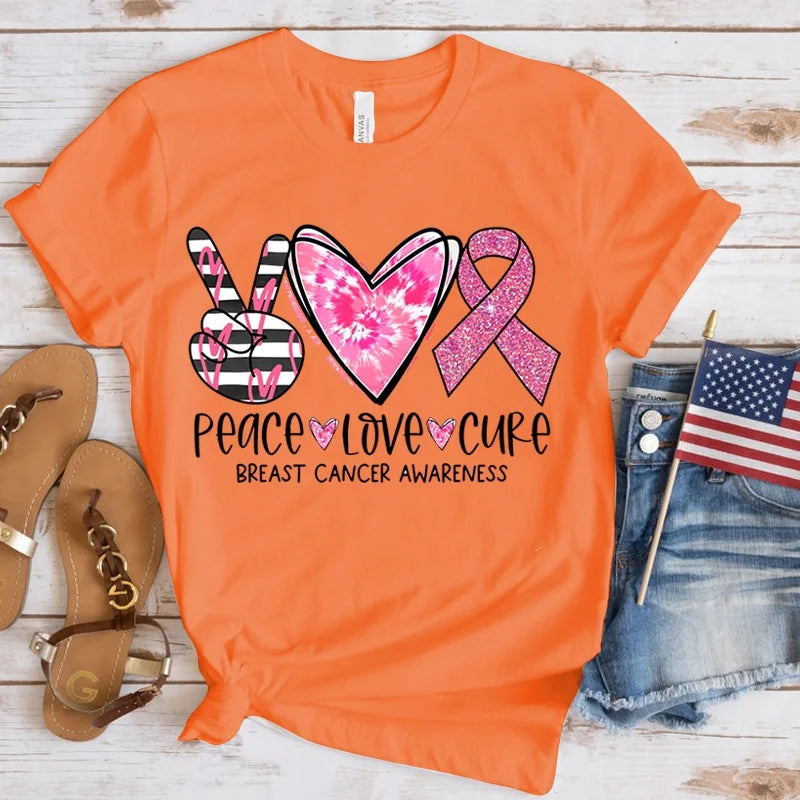 the PEACE LOVE CURE - Breast Cancer Awareness T-Shirt for Women