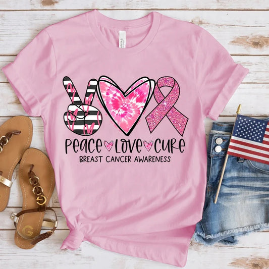 the PEACE LOVE CURE - Breast Cancer Awareness T-Shirt for Women