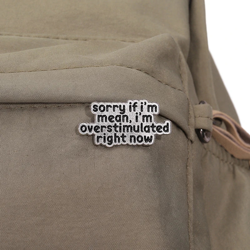 the OVERSTIMULATED - Mental Health ADHD Enamel Pin, Sorry If I'm Mean I'm Overstimulated Right Now Metal Brooch Lapel Badge Jewelry Gift