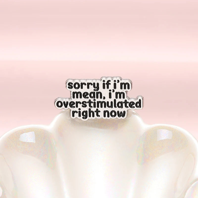 the OVERSTIMULATED - Mental Health ADHD Enamel Pin, Sorry If I'm Mean I'm Overstimulated Right Now Metal Brooch Lapel Badge Jewelry Gift