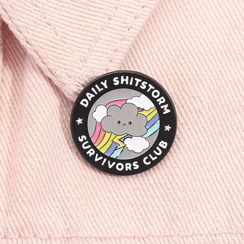 the SHITSTORM SURVIVOR - Daily Shitstorm Survivors Club Enamel Pin, Cartoon Dark Clouds Rainbow Brooch Lapel, Badge Jewelry Gift for Friends